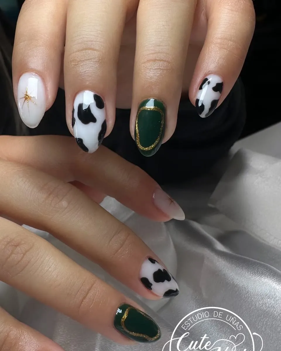 Cow print with emerald green and gold accents